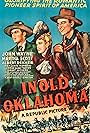 John Wayne, Albert Dekker, and Martha Scott in In Old Oklahoma (1943)