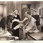 Pat O'Brien, Lester Dorr, Glenda Farrell, and Clarence Muse in The Personality Kid (1934)