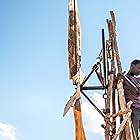 Maxwell Simba in The Boy Who Harnessed the Wind (2019)