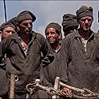 Dustin Hoffman, Steve McQueen, Don Gordon, and Bill Mumy in Papillon (1973)