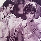 Marlene Dietrich and Bruce Cabot in The Flame of New Orleans (1941)