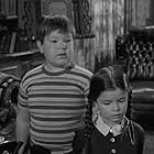 Lisa Loring and Ken Weatherwax in The Addams Family (1964)