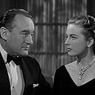 George Sanders and Coleen Gray in Death of a Scoundrel (1956)