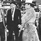 Roy Barcroft, Edmund Cobb, James Craven, and Buck Jones in White Eagle (1941)