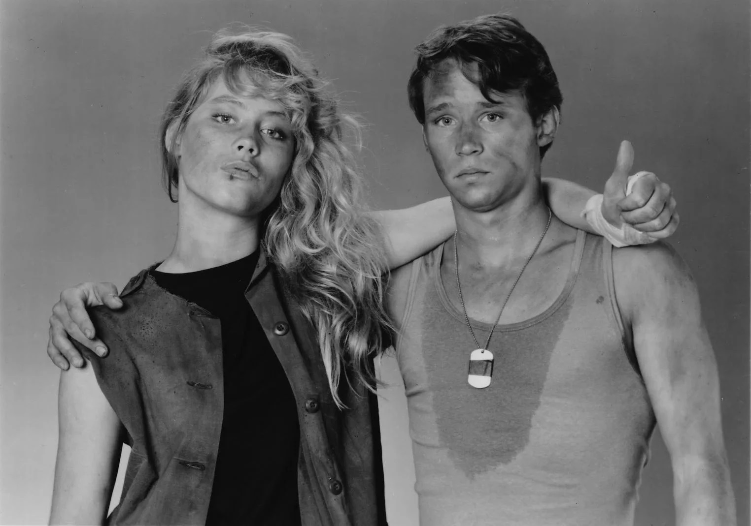 Devin Hoelscher and Emily Longstreth in Wired to Kill (1986)