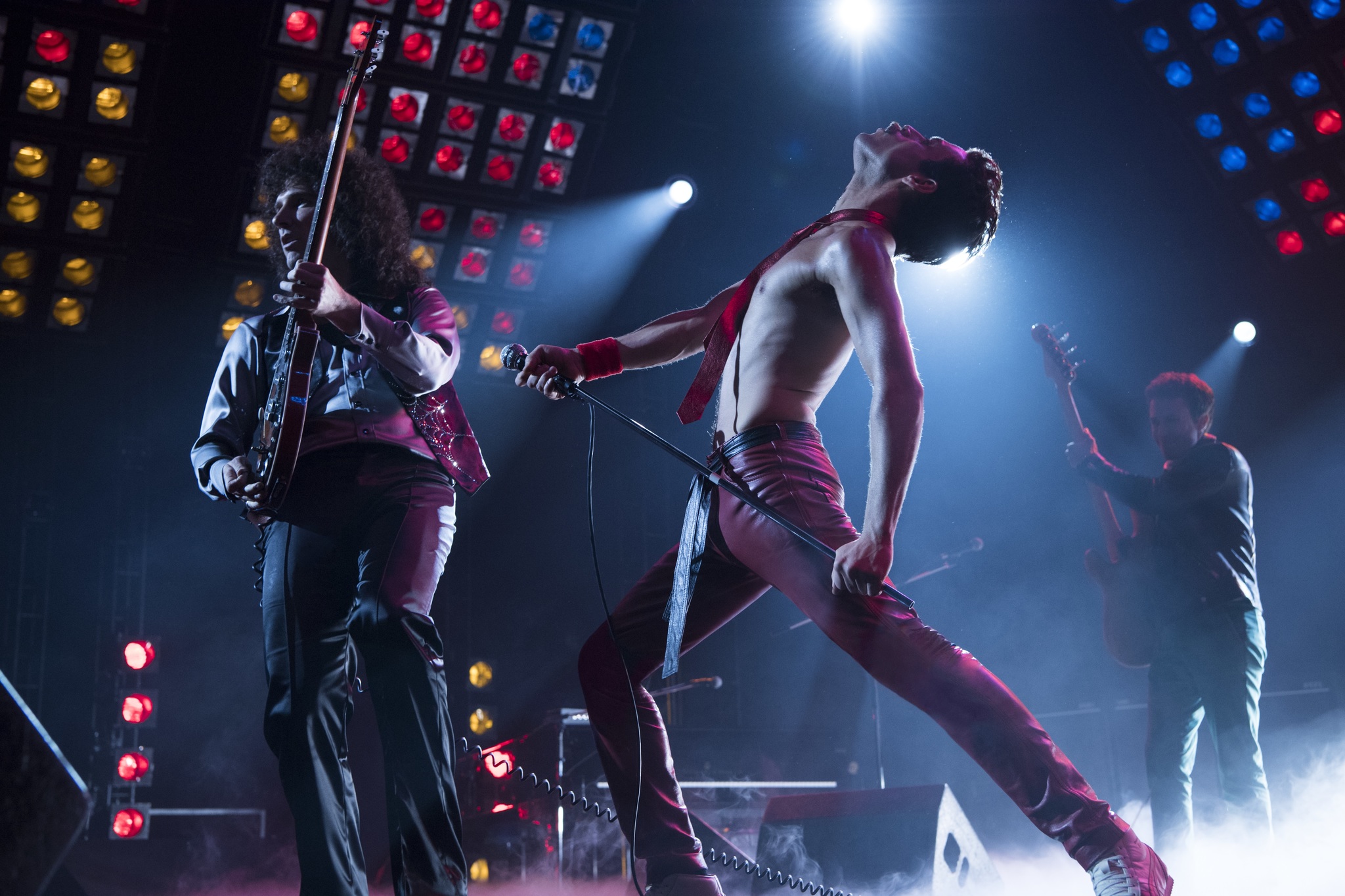 Joseph Mazzello, Rami Malek, and Gwilym Lee in Bohemian Rhapsody (2018)