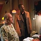 Eddie Murphy and Peter Boyle in The Adventures of Pluto Nash (2002)