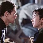 Willem Dafoe and Luo Yan in Pavilion of Women (2001)