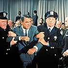 Cary Grant, Ken Lynch, and Patrick McVey in North by Northwest (1959)