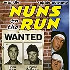 Robbie Coltrane and Eric Idle in Nuns on the Run (1990)