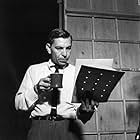 Jack Webb Reading script on set, 1953. "Dragnet" 0068-1012