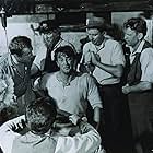 Robert Mitchum, Peter Ustinov, Ronald Fraser, and Chips Rafferty in The Sundowners (1960)