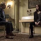 Ulrich Thomsen and Megan Boone in The Blacklist (2013)