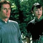 Willem Dafoe and Luo Yan in Pavilion of Women (2001)