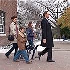 Jim Carrey, Carla Gugino, Madeline Carroll, and Maxwell Perry Cotton in Mr. Popper's Penguins (2011)