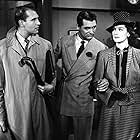 Cary Grant, Ralph Bellamy, and Rosalind Russell in His Girl Friday (1939)