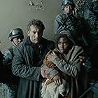 Clive Owen and Clare-Hope Ashitey in Children of Men (2006)