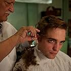 George Touliatos and Robert Pattinson in Cosmopolis (2012)