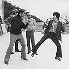 Bruce Lee, Raymond Chow, and John Saxon in Enter the Dragon (1973)