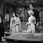 Yvonne De Carlo, Fred Gwynne, Al Lewis, and Beverley Owen in The Munsters (1964)