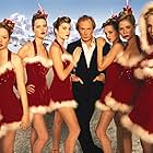 Bill Nighy, Sarah Holland, Meredith Ostrom, Clare Bennett, Sarah Atkinson, Vicki Murdoch, Katherine Poulton, and Tuuli Shipster in Love Actually (2003)