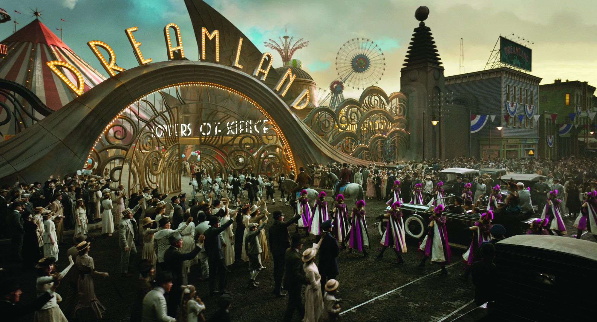 Danny DeVito, Michael Keaton, Colin Farrell, Stephen Samson, Matthew Cox, Mark Reader, Alfie Allen, Eva Green, Joseph Gatt, Hugh O'Brien, Georgie-May Tearle, Andres Austin Bennett, Michael Barron, Callum Forman, Arthur Wilde, George Gjiggy Francis, Nico Parker, and Megan Crossland in Dumbo (2019)