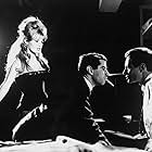 Brigitte Bardot, Roger Vadim, and Michel Subor in Please, Not Now! (1961)