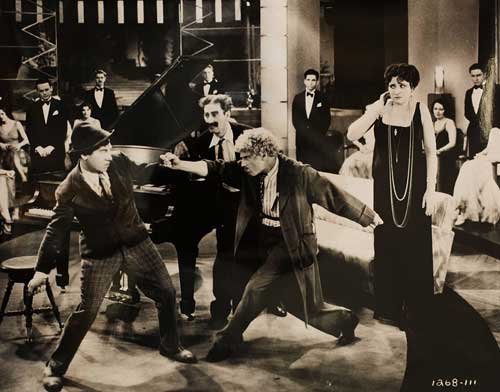 Groucho Marx, Margaret Dumont, Chico Marx, Harpo Marx, and The Marx Brothers in Animal Crackers (1930)