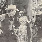 Joan Jaccard, Jack Mower, and Jay Wilsey in The Cheyenne Kid (1930)