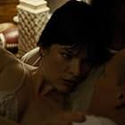 Milla Jovovich and Woody Harrelson in Shock and Awe (2017)