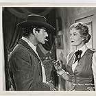 Binnie Barnes and Gilbert Roland in The Dude Goes West (1948)