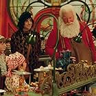 Tim Allen, Spencer Breslin, and David Krumholtz in The Santa Clause 2 (2002)