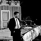 Efrem Zimbalist, Jr. on the set of "77 Sunset Strip" filming the episode, "Vamp Until Ready," January 30, 1961.