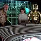 Anthony Daniels, Carrie Fisher, and Alex McCrindle in Star Wars: Episode IV - A New Hope (1977)
