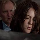 Ulrich Thomsen and Megan Boone in The Blacklist (2013)