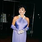 Joan Collins at an event for The 52nd Annual Golden Globe Awards (1995)