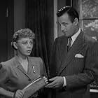 Tom Conway and Isabel Jewell in The Falcon and the Co-eds (1943)