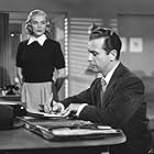 Dick Powell and Lizabeth Scott in Pitfall (1948)