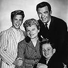 Hugh Beaumont, Barbara Billingsley, Tony Dow, and Jerry Mathers in Leave It to Beaver (1957)