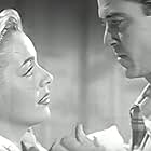 Mary Beth Hughes and Charles Russell in Inner Sanctum (1948)