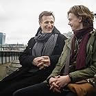 Liam Neeson and Thomas Brodie-Sangster in Red Nose Day Actually (2017)