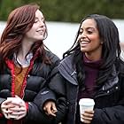 Kacey Rohl and Azie Tesfai walking with coffees on the set of 'This American Housewife' in Vancouver, Canada.