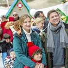 Marc Blucas, Tricia Helfer, and Benjamin Wosk in Operation Christmas (2016)