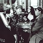 Moe Howard, Larry Fine, Lorna Gray, and Curly Howard in You Nazty Spy! (1940)