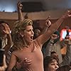 Betty Gilpin and Britney Young in GLOW (2017)