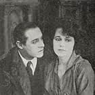 Alice Brady and Elliott Dexter in Woman and Wife (1918)