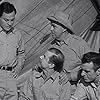 John Agar, Hugh Beaumont, Phil Chambers, and Nestor Paiva in The Mole People (1956)