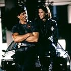 Sandra Bullock and Sylvester Stallone in Demolition Man (1993)