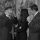 John Astin, Carolyn Jones, and Jesse White in The Addams Family (1964)