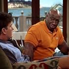 Charlie Sheen and Michael Clarke Duncan in Two and a Half Men (2003)